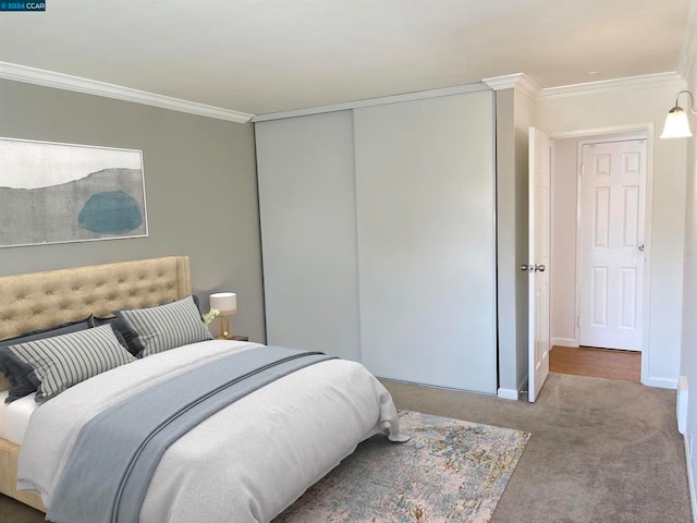 carpeted bedroom featuring crown molding