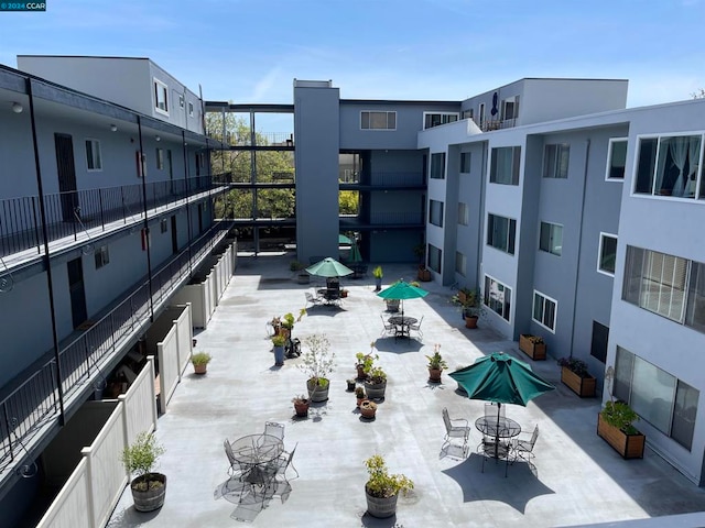 view of property's community featuring a patio area