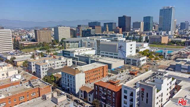 property's view of city with a mountain view