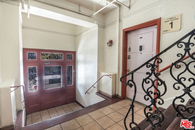 view of tiled foyer entrance