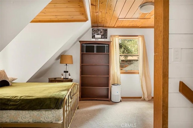 carpeted bedroom with lofted ceiling and wooden ceiling