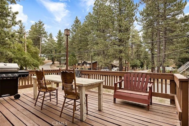 wooden terrace with grilling area