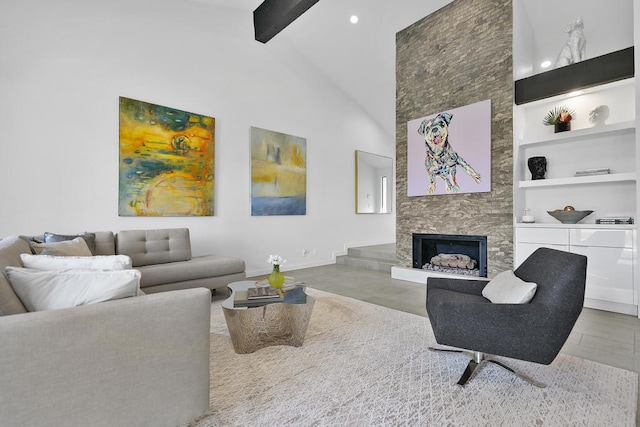 living room with a stone fireplace, beam ceiling, high vaulted ceiling, and built in features