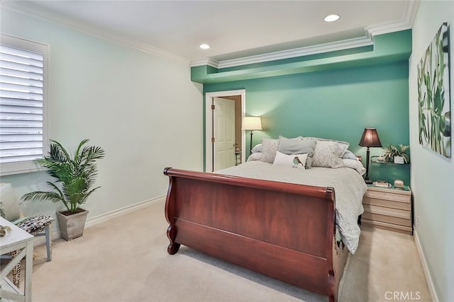 bedroom featuring crown molding and light colored carpet