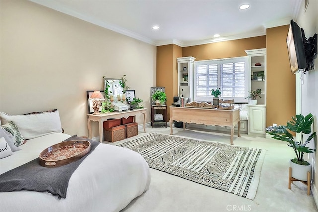 sitting room featuring crown molding and light colored carpet