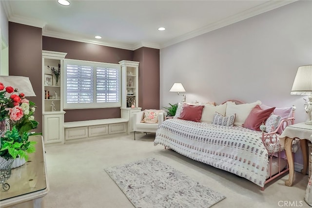 carpeted bedroom featuring crown molding