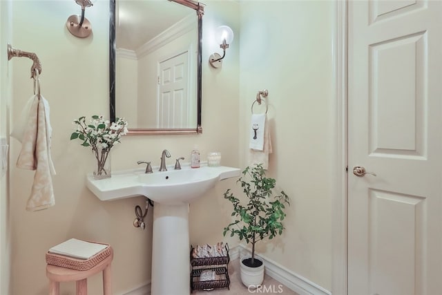 bathroom with ornamental molding