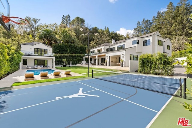 view of basketball court with tennis court