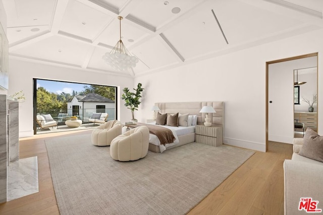 bedroom with light hardwood / wood-style flooring, a chandelier, and coffered ceiling