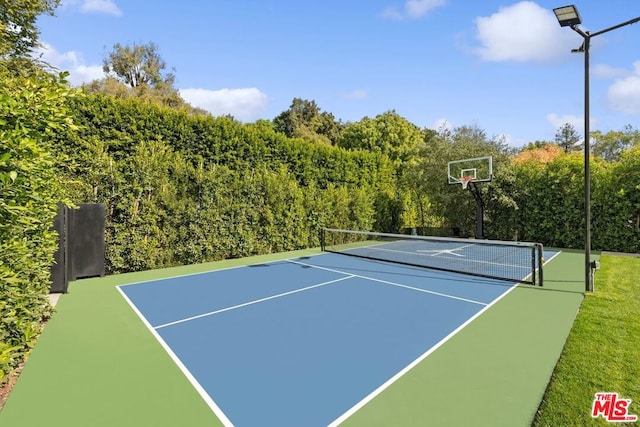 view of sport court featuring basketball court