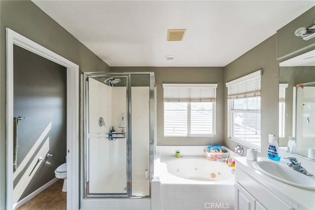 full bathroom featuring independent shower and bath, vanity, toilet, and tile patterned floors