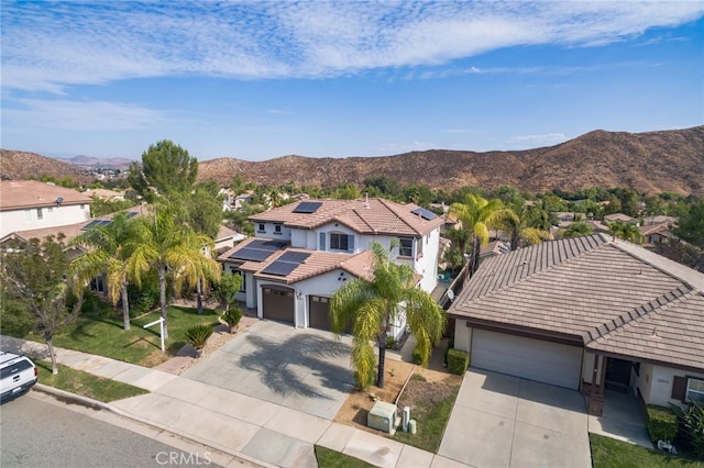 view of front of house featuring a mountain view