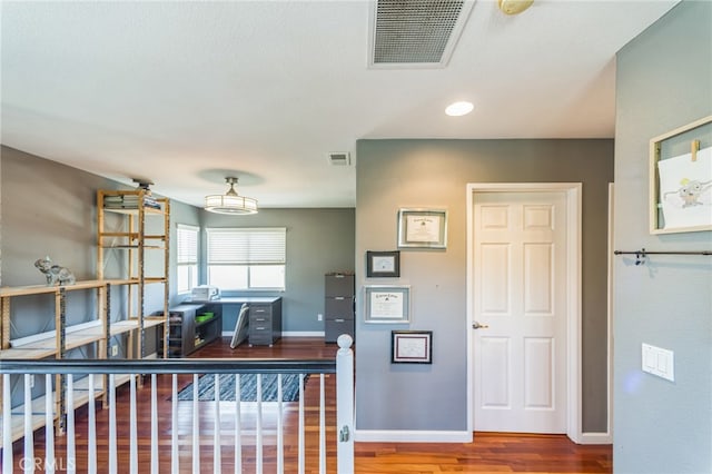 kitchen with hardwood / wood-style flooring