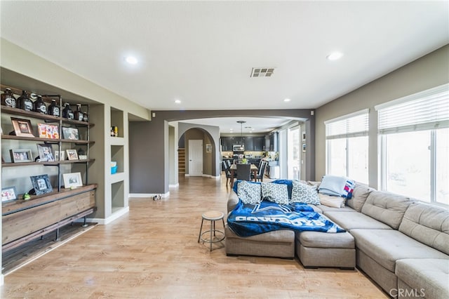 living room with light hardwood / wood-style floors