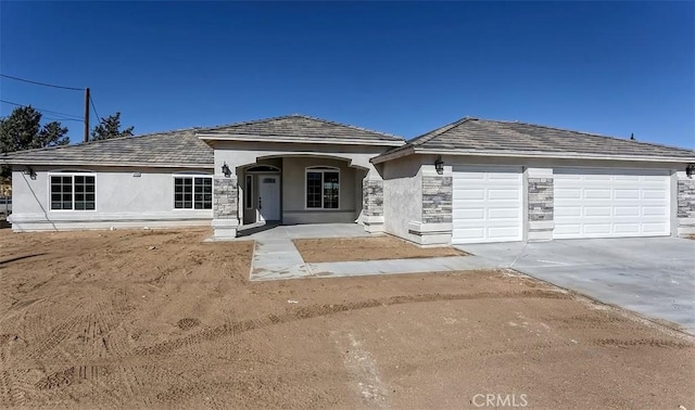 view of front of home with a garage