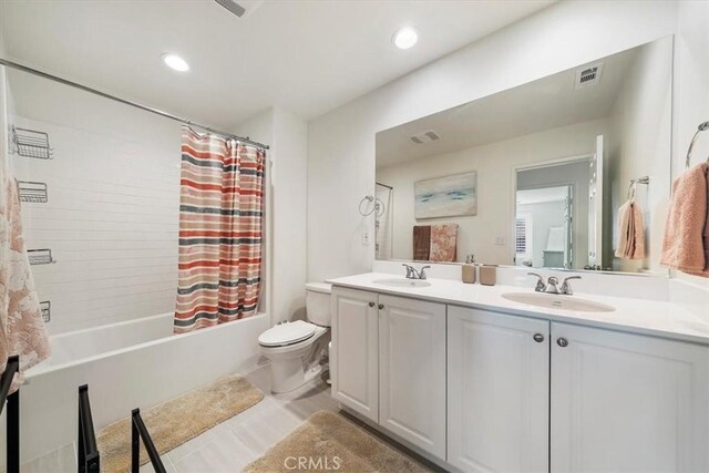 full bathroom with vanity, toilet, and shower / bathtub combination with curtain