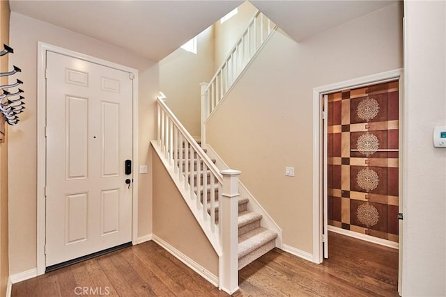 entrance foyer featuring hardwood / wood-style floors