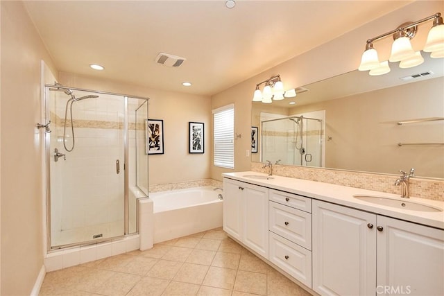 bathroom with separate shower and tub, tile patterned flooring, and vanity