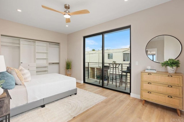 bedroom featuring access to outside, ceiling fan, and light hardwood / wood-style floors