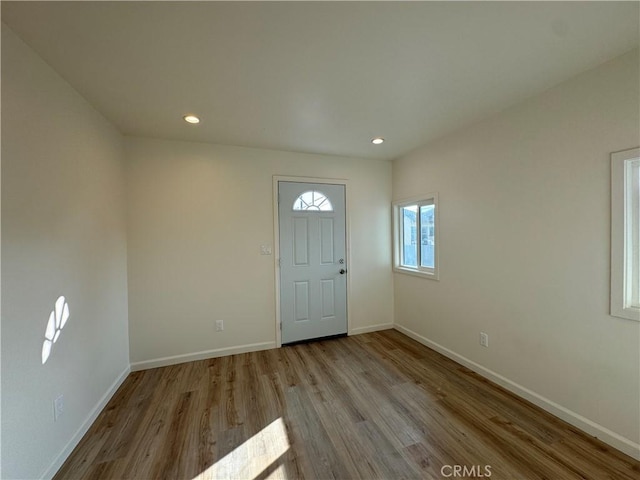 foyer with light wood-type flooring