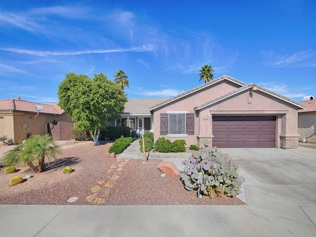 single story home featuring a garage