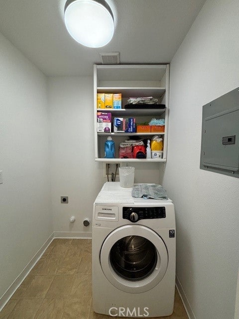 washroom with washer / clothes dryer and electric panel