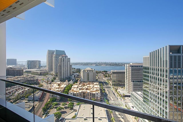 balcony featuring a water view