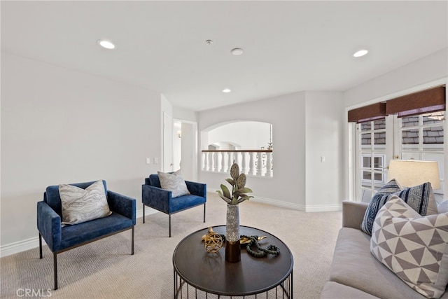 living room with light colored carpet