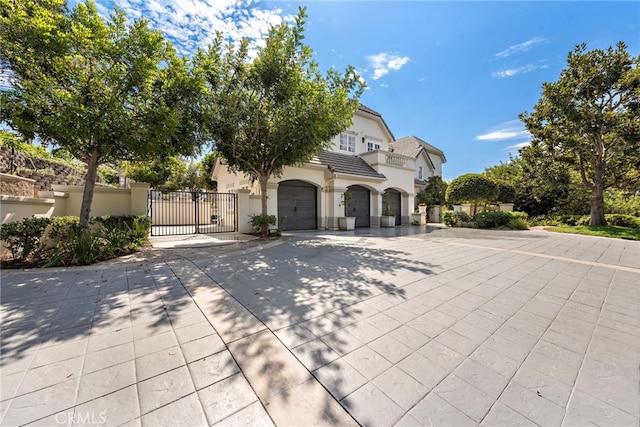 view of front of property with a garage