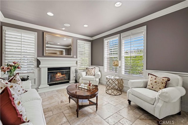 sitting room featuring crown molding