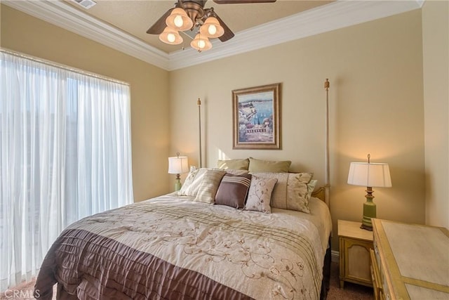 bedroom featuring ornamental molding and ceiling fan