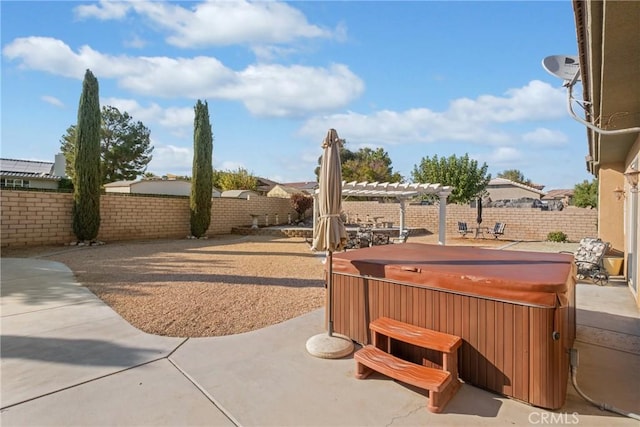 view of patio featuring a pergola and a hot tub