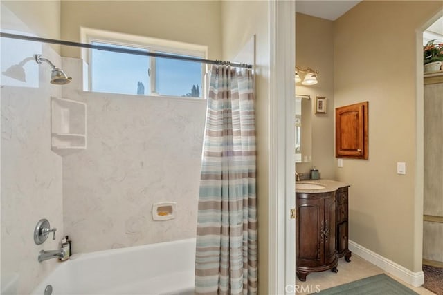 bathroom with vanity and shower / tub combo