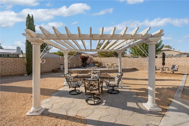 view of patio featuring a pergola