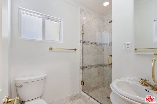 bathroom with crown molding, an enclosed shower, tile patterned floors, sink, and toilet