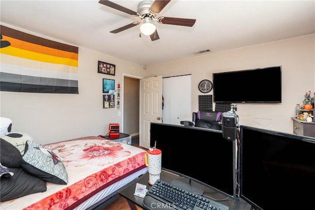 bedroom with a ceiling fan and visible vents
