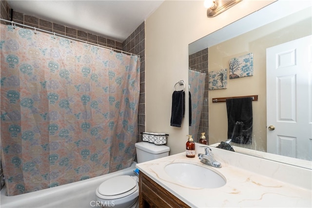 full bathroom featuring shower / tub combo, vanity, and toilet