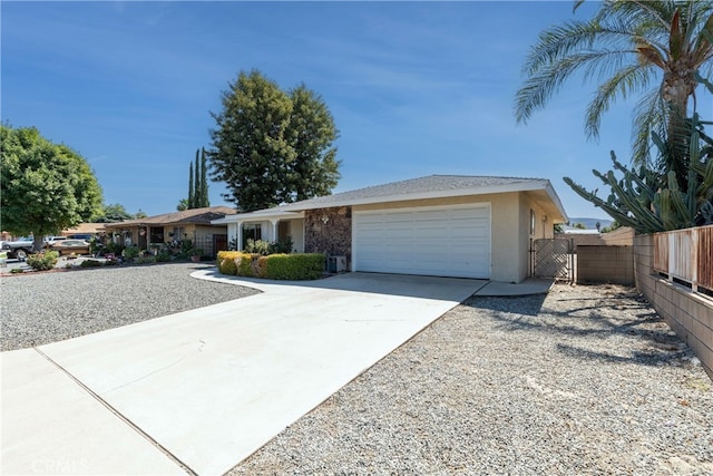 single story home featuring a garage