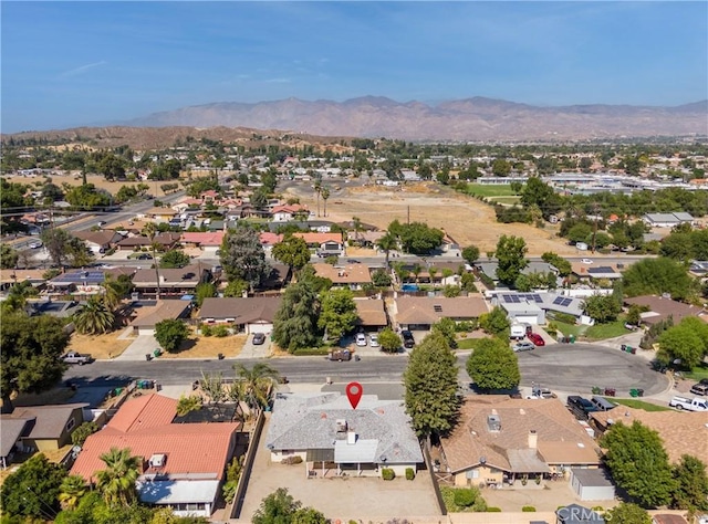 drone / aerial view featuring a mountain view and a residential view