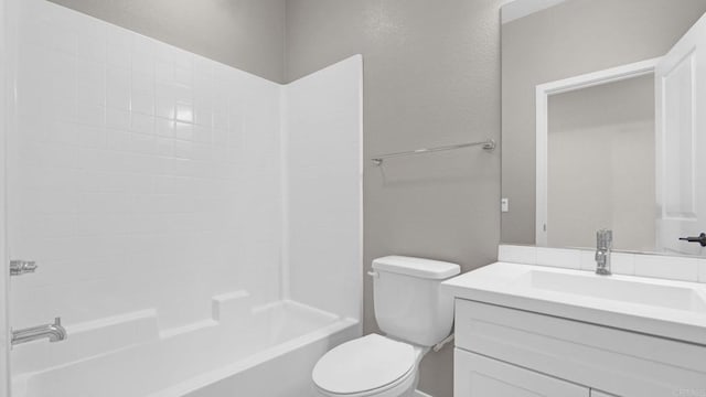 full bathroom with vanity,  shower combination, and toilet