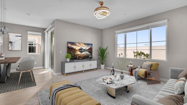 living room with light hardwood / wood-style flooring