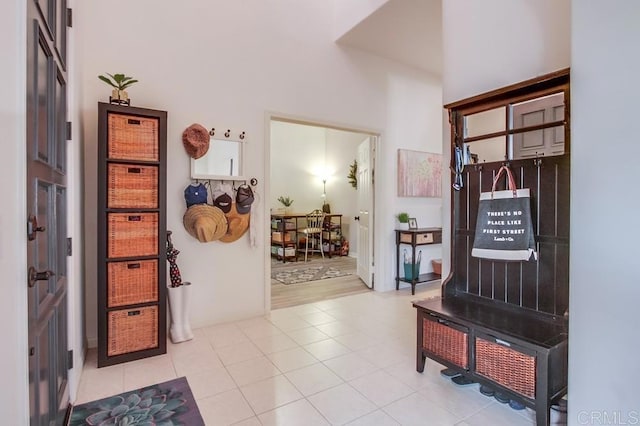 mudroom featuring light tile patterned flooring