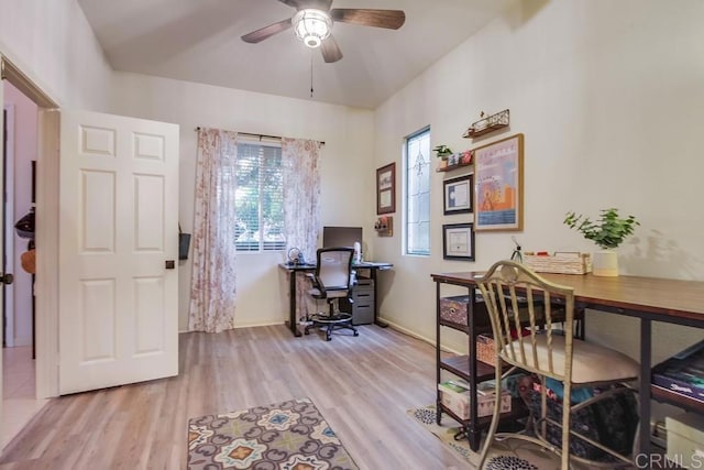 office space featuring light wood-type flooring and ceiling fan