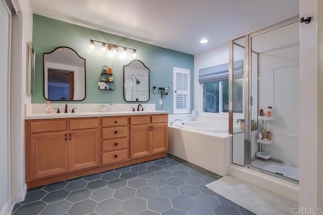 bathroom with tile patterned floors, vanity, and plus walk in shower