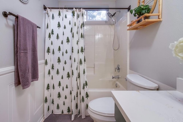 full bathroom featuring vanity, toilet, and shower / tub combo with curtain