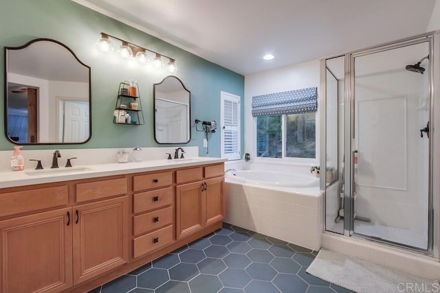 bathroom featuring tile patterned floors, vanity, and separate shower and tub