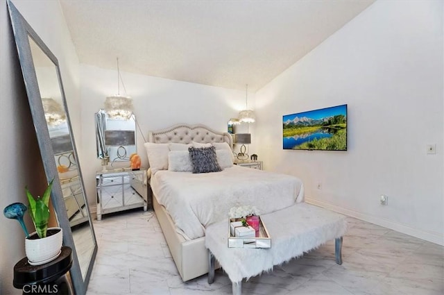 bedroom with vaulted ceiling