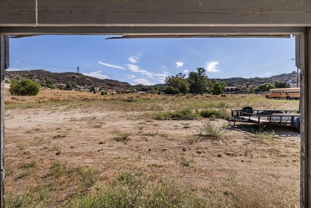 mountain view featuring a rural view