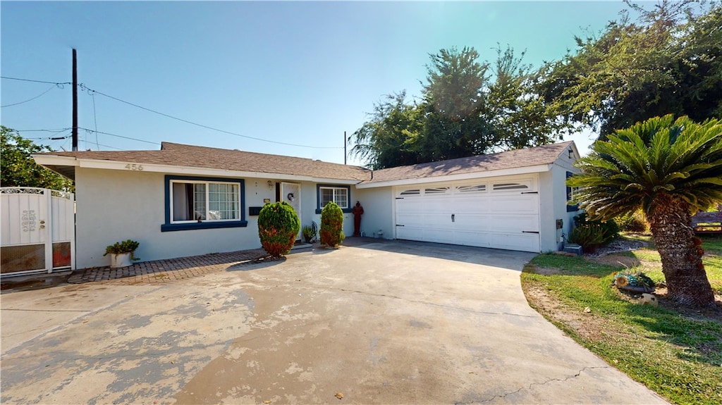 single story home with a garage