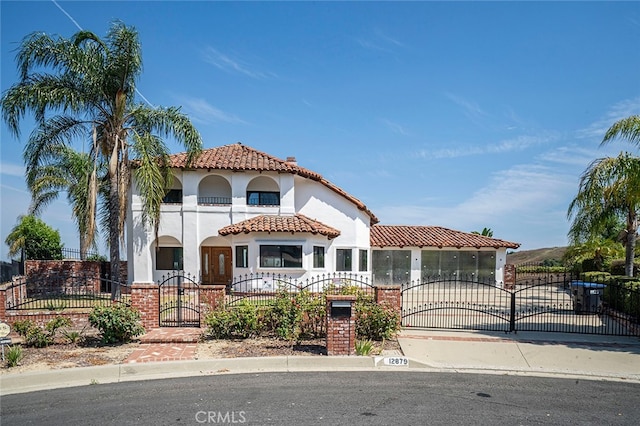 mediterranean / spanish-style house featuring a balcony